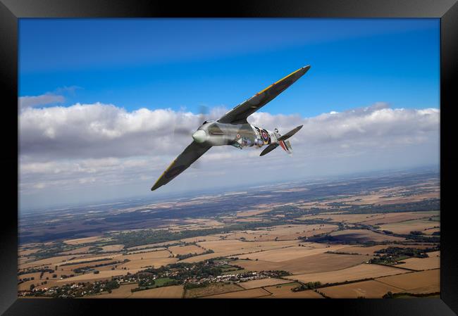 Spitfire TR 9 on a roll Framed Print by Gary Eason