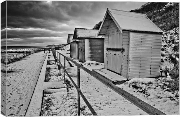 Snow (I mean Beach) Huts at Overstrand Canvas Print by Paul Macro
