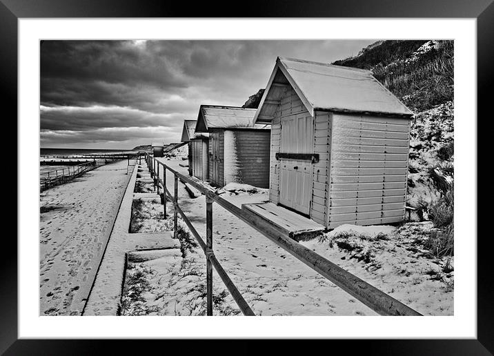 Snow (I mean Beach) Huts at Overstrand Framed Mounted Print by Paul Macro