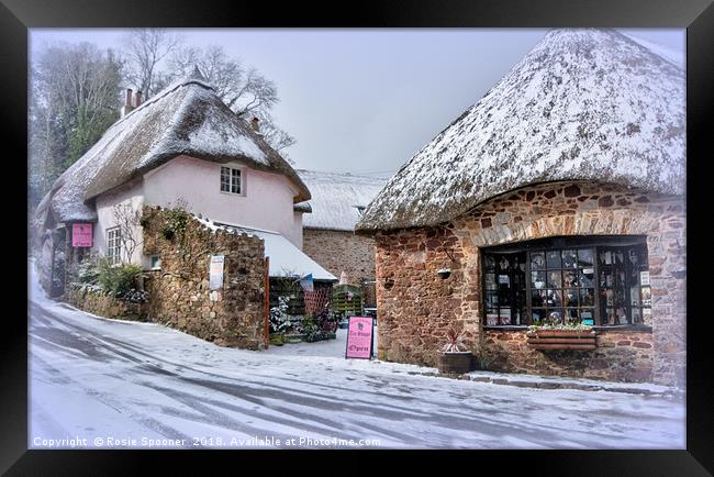 Snowy day at Cockington Village in Torquay Framed Print by Rosie Spooner