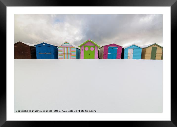 Beach Huts And Snow Framed Mounted Print by matthew  mallett