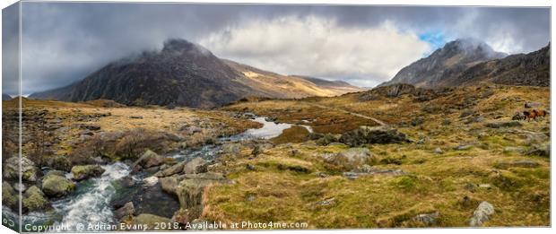 Pen Yr Ole Wen and Tryfan Mountain Canvas Print by Adrian Evans