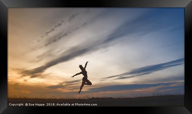 Jumping for joy at sunrise Framed Print by Sue Hoppe