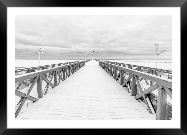 Southport Pier in the Snow Framed Mounted Print by Roger Green