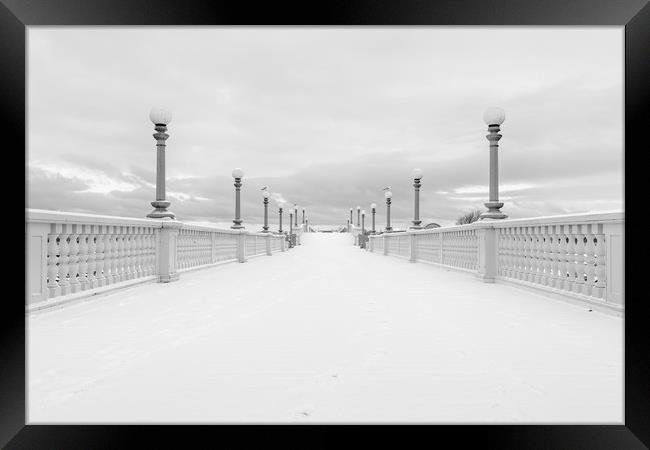 Venetian Bridge in the Snow Framed Print by Roger Green