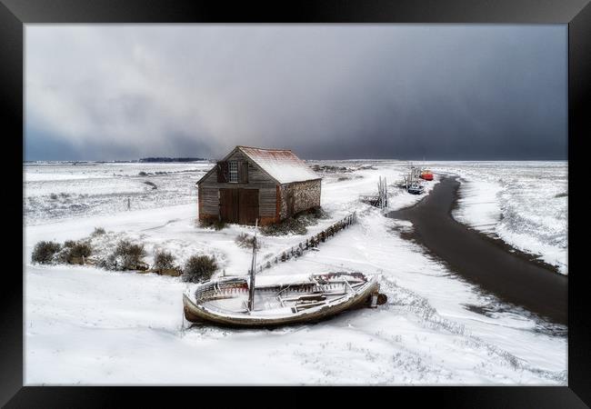 Snow around the old coal barn at Thornham  Framed Print by Gary Pearson