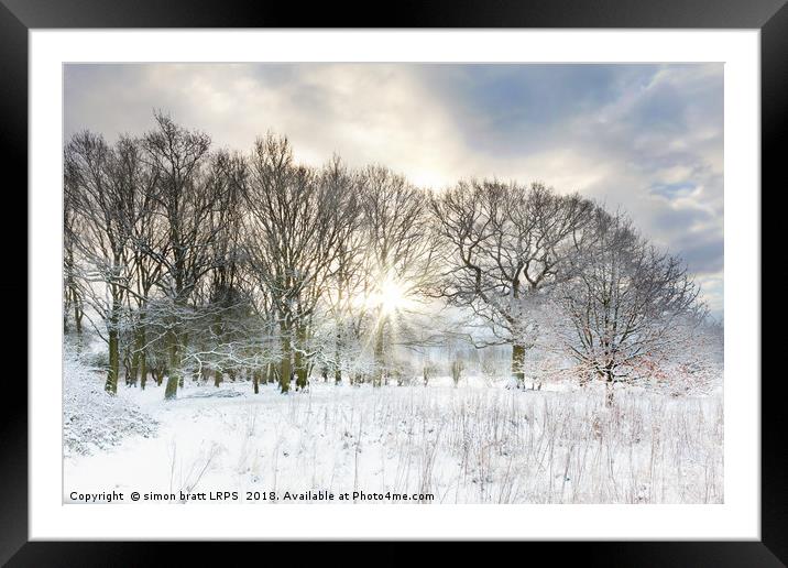 Snow covered rural trees with early morning sunris Framed Mounted Print by Simon Bratt LRPS