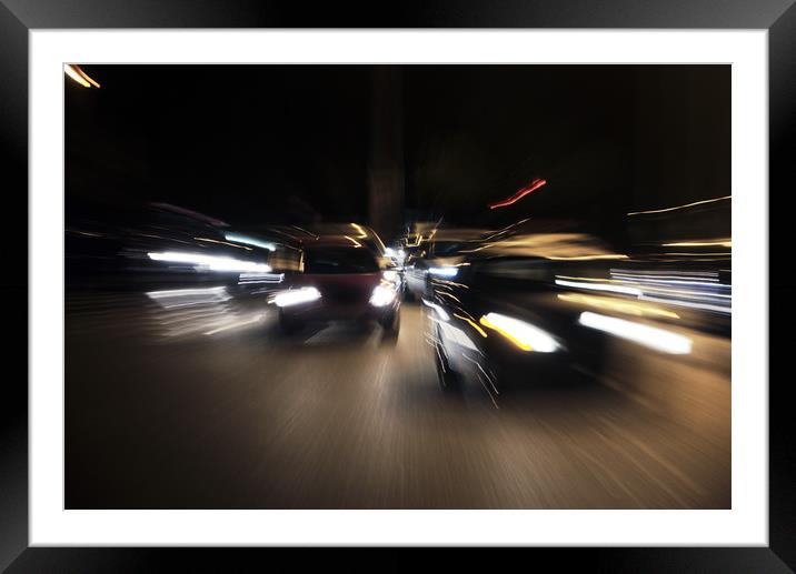 Speed in an urban evening Framed Mounted Print by Jose Manuel Espigares Garc