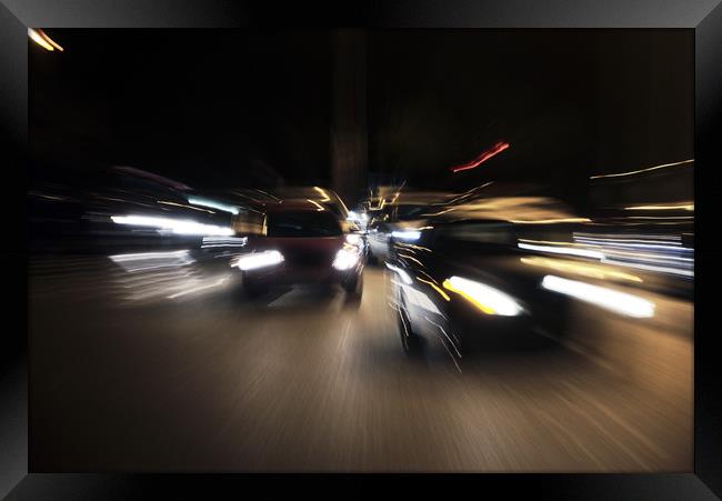 Speed in an urban evening Framed Print by Jose Manuel Espigares Garc
