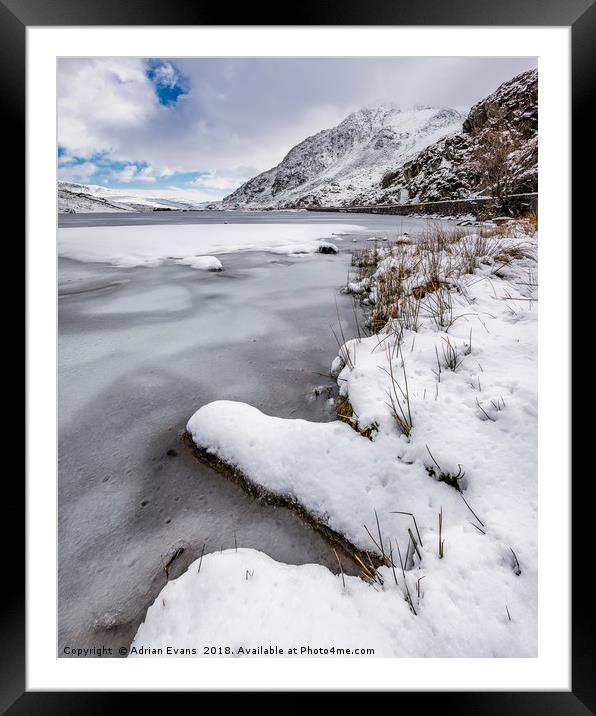 Snowfall at Ogwen Lake Snowdonia Framed Mounted Print by Adrian Evans