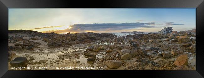 sunrise over rocky shoreline Framed Print by Sue Hoppe