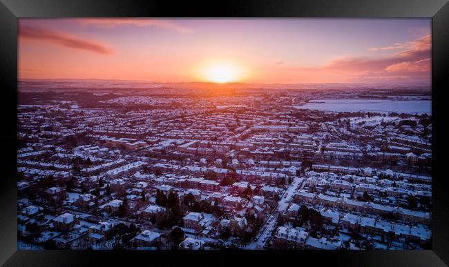 Sunrise over a snowy suburb Framed Print by Richard Nicholls