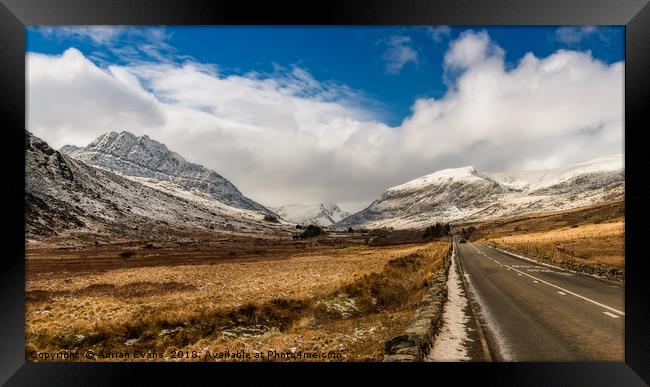 Mountain Highway Snowdonia Framed Print by Adrian Evans