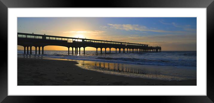 Coastal holiday perfect sunrise over pier with sea Framed Mounted Print by Steve Mantell