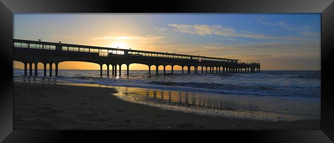Coastal holiday perfect sunrise over pier with sea Framed Print by Steve Mantell