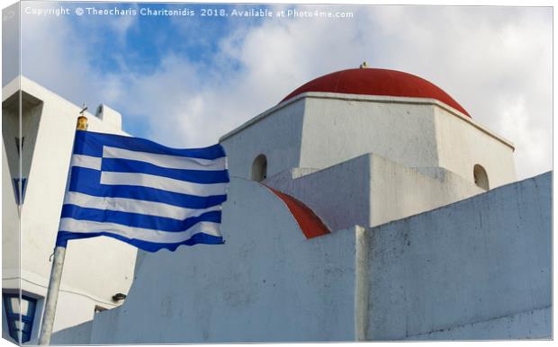 Mykonos, Greece Greek flag by whitewashed church. Canvas Print by Theocharis Charitonidis