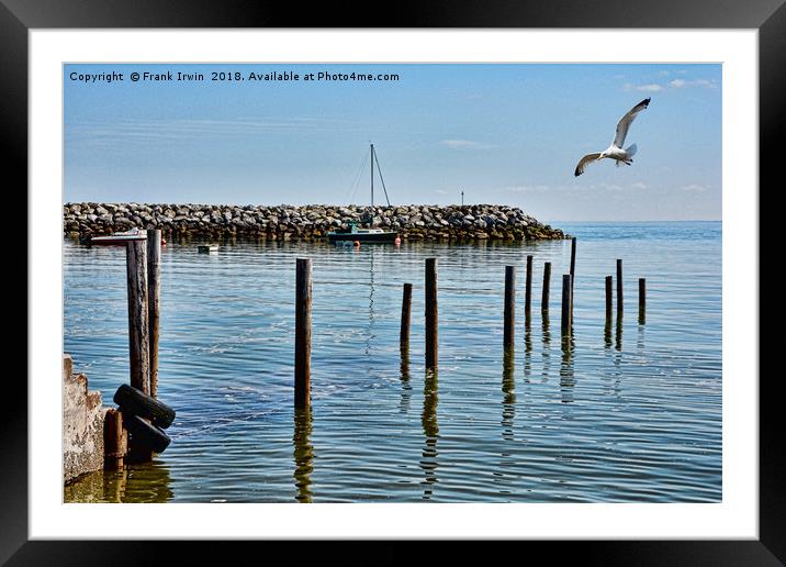 The submerged jetty at Rhos-on-Sea. North Wales. Framed Mounted Print by Frank Irwin