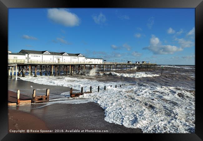 Rough seas by the pier on Teignmouth Beach  Framed Print by Rosie Spooner