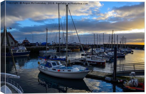 Sunset over Anstruther harbour Canvas Print by Angus McComiskey