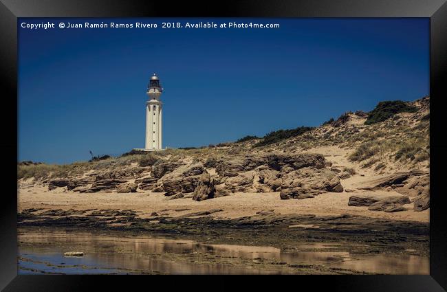 Lighthouse on the beach Framed Print by Juan Ramón Ramos Rivero