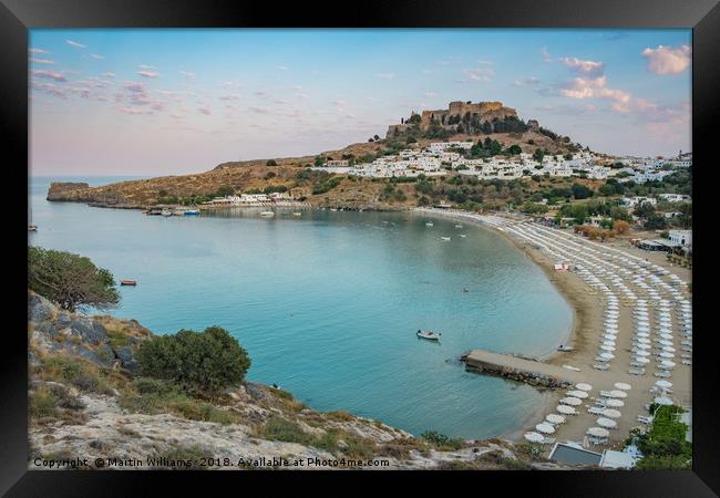 View of Lindos over Lindos Bay Framed Print by Martin Williams