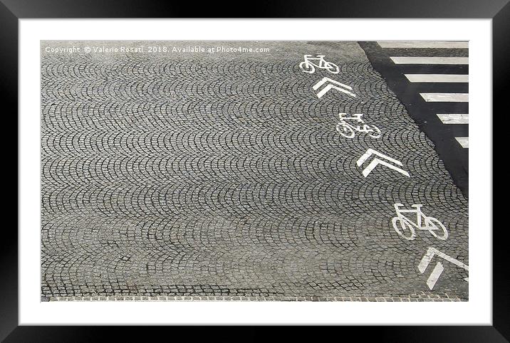 Bike lane and direction arrows Framed Mounted Print by Valerio Rosati