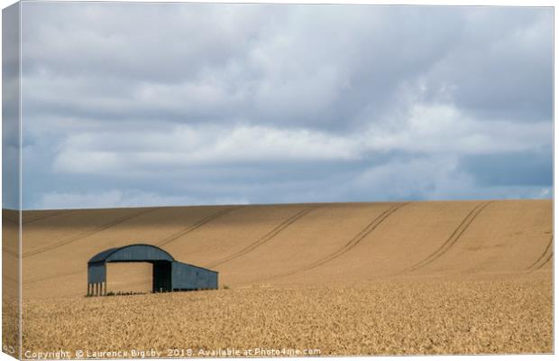 Barn within the Wheat Canvas Print by Laurence Bigsby