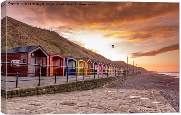 Saltburn beach huts at sunset Canvas Print by keith sayer