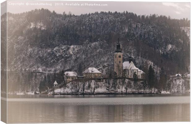 Bled Island Dusted With Snow Canvas Print by rawshutterbug 