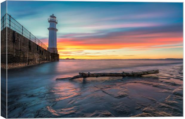 Sunset over Newhaven Lighthouse Canvas Print by Miles Gray