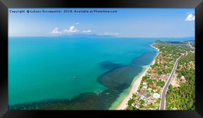Aerial panoramic view of ocean, beach and blue clo Framed Print by Łukasz Szczepański