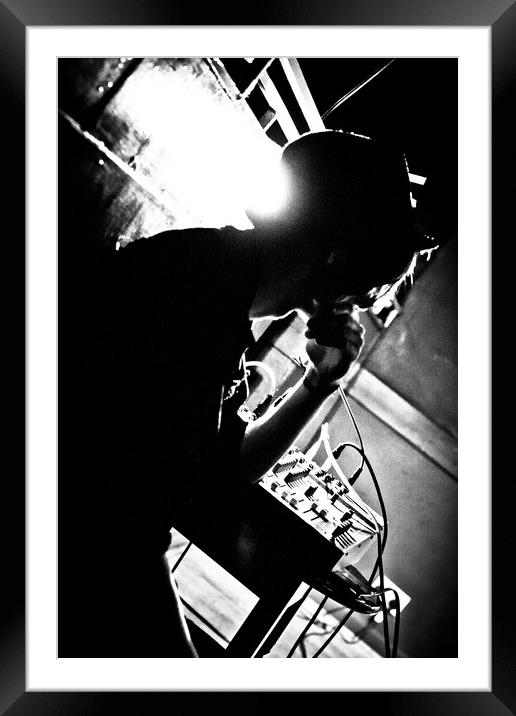 DJ in Nightclub Framed Mounted Print by Donnie Canning