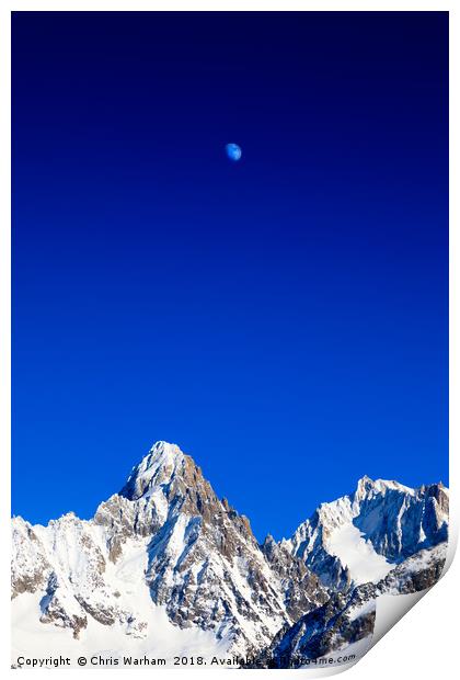 Moon above the French Alps against a deep blue sky Print by Chris Warham