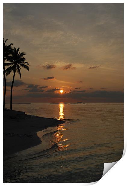 Sun setting behind clouds - Maldives Print by Madeline Harris