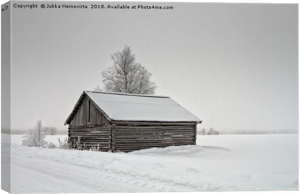 Snow Covered Barn House By The Road Canvas Print by Jukka Heinovirta