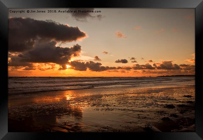 Daybreak on the beach in Northumberland Framed Print by Jim Jones