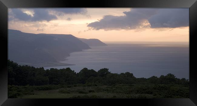 Exmoor coast at sunset Framed Print by Ian Middleton