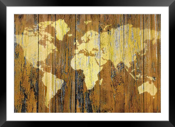 Map of the world on wooden surface Framed Mounted Print by Guido Parmiggiani
