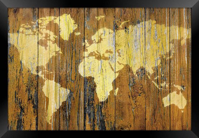 Map of the world on wooden surface Framed Print by Guido Parmiggiani