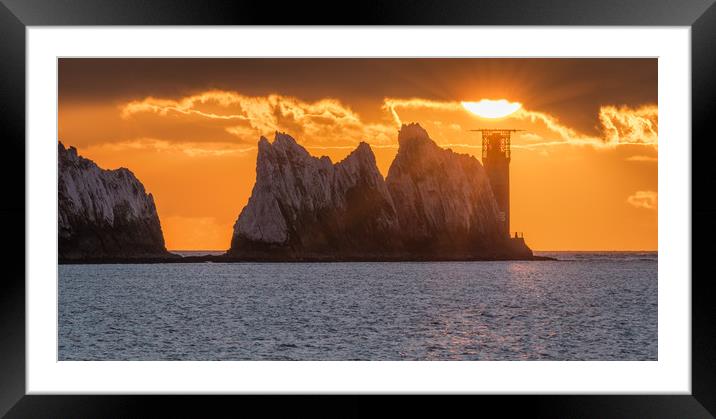Setting sun over the lighthouse Framed Mounted Print by Alf Damp