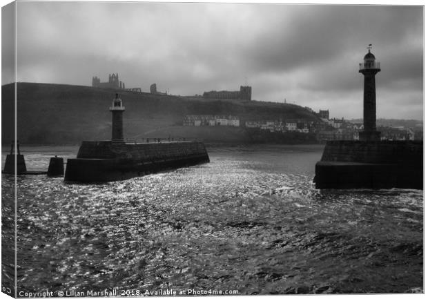 Entrance to Whitby Harbour.  Canvas Print by Lilian Marshall