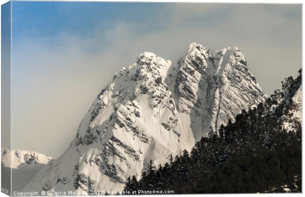 Snow on the mountain peaks Canvas Print by Fabrizio Malisan