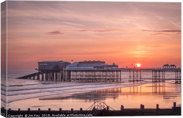 A Glowing Sunrise at Cromer Pier Canvas Print by Jim Key