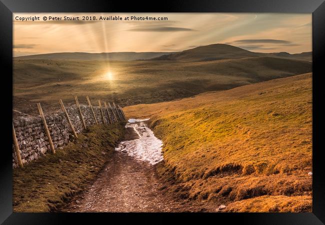 Setting sun in the Yorkshire Dales Framed Print by Peter Stuart