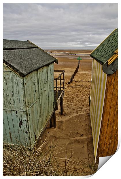View through the huts at Wells Print by Paul Macro