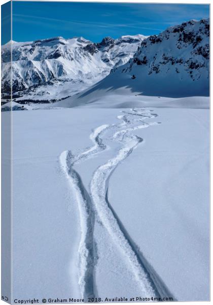 Snowboard tracks Canvas Print by Graham Moore