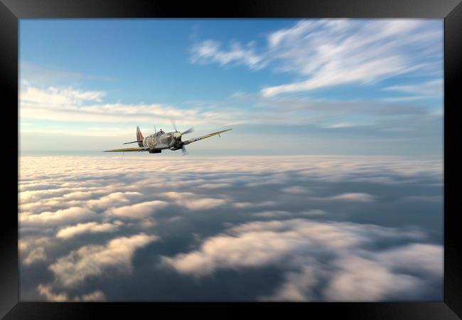 Spitfire In The Clouds Framed Print by J Biggadike