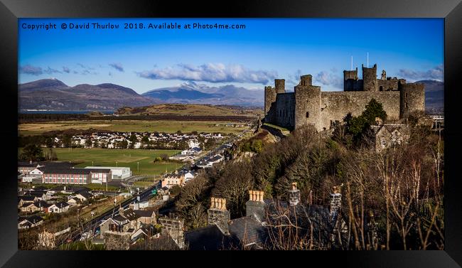 Harlech Castle and Mount Snowdon in North Wales Framed Print by David Thurlow