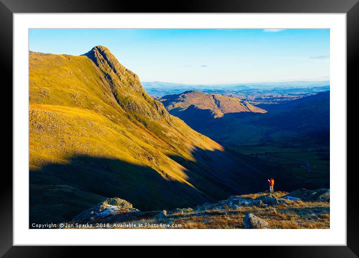 Walker looking towards Pike o’Stickle Framed Mounted Print by Jon Sparks
