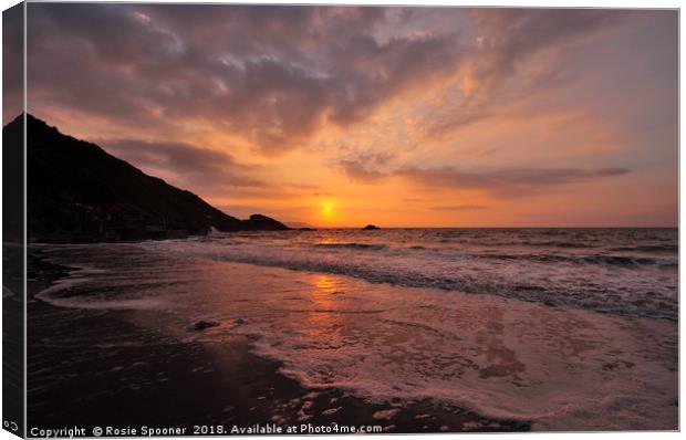 Sunrise on Looe Beach in South East Cornwall Canvas Print by Rosie Spooner